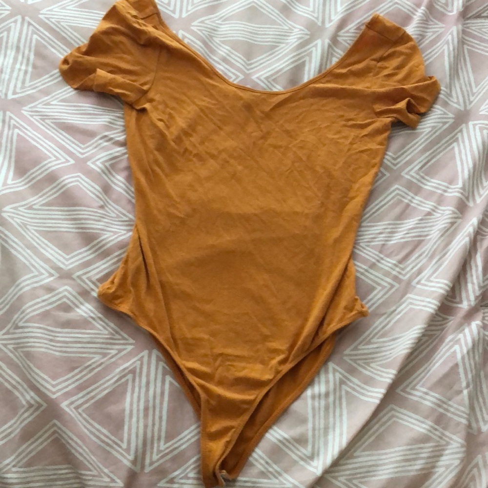 Off the shoulder body suit.